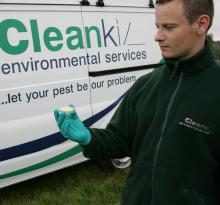 Cleankill pest controller in front of van
